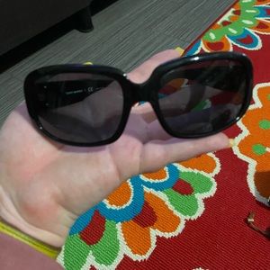 Tory Burch sunglasses with case.